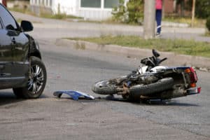 crash moto bike and car on road